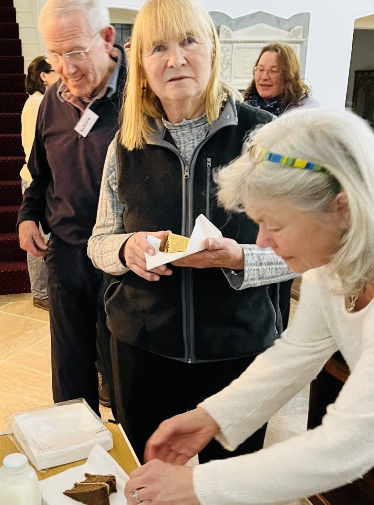 The Poet Laureate of Penryn - Jeni Whittaker - enjoying some cake at Helston Chamber Choir Director of Music's birthday